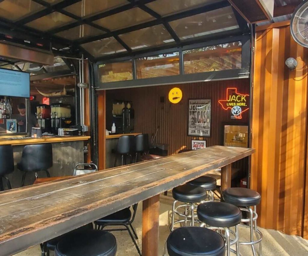 Custom hybrid food truck interior with bar seating