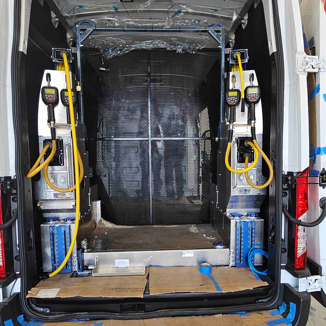 Compact auto service van interior with dual oiling stations