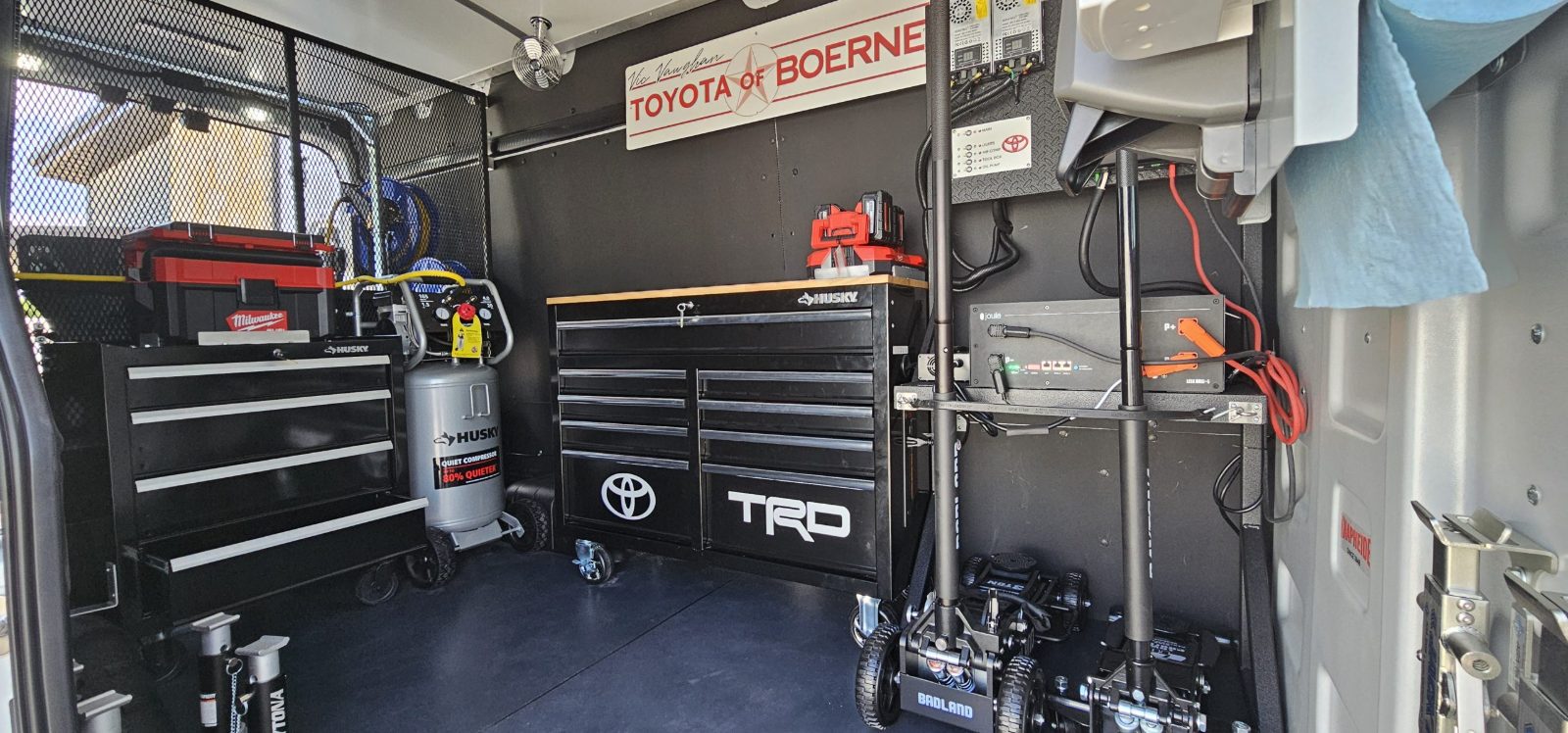 Custom Sienna build interior with branded TRD tool box and power system